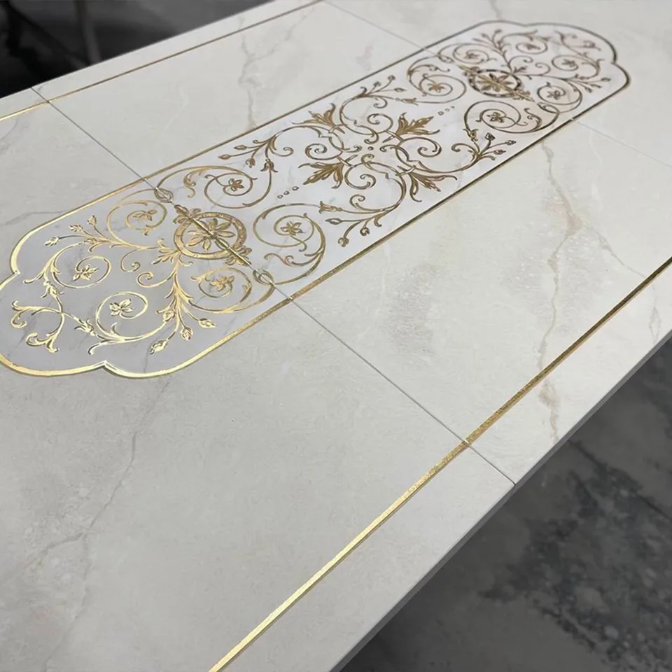 Calacatta marble-effect table with gold leaf details